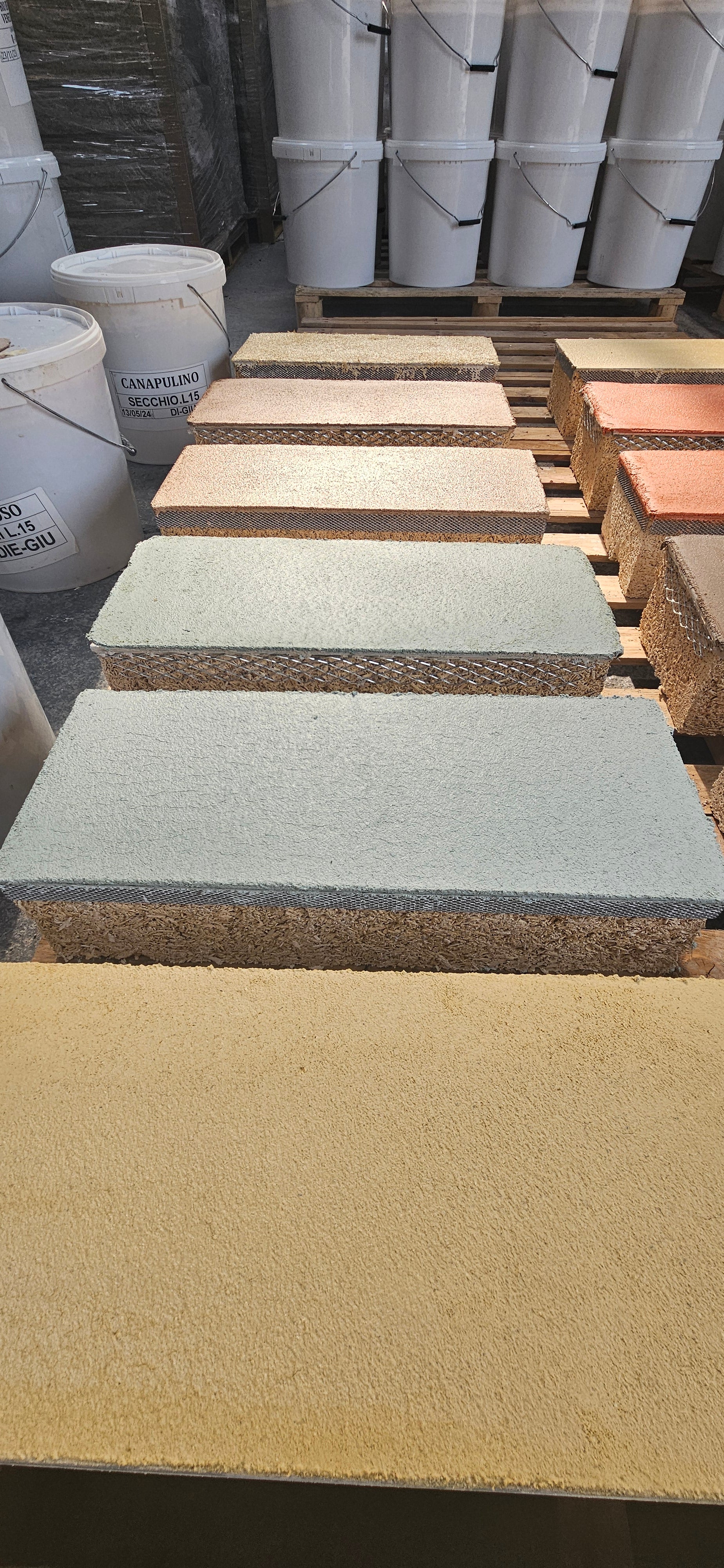 Samples of Coloured Hemp Lime Plaster on Hemp Blocks