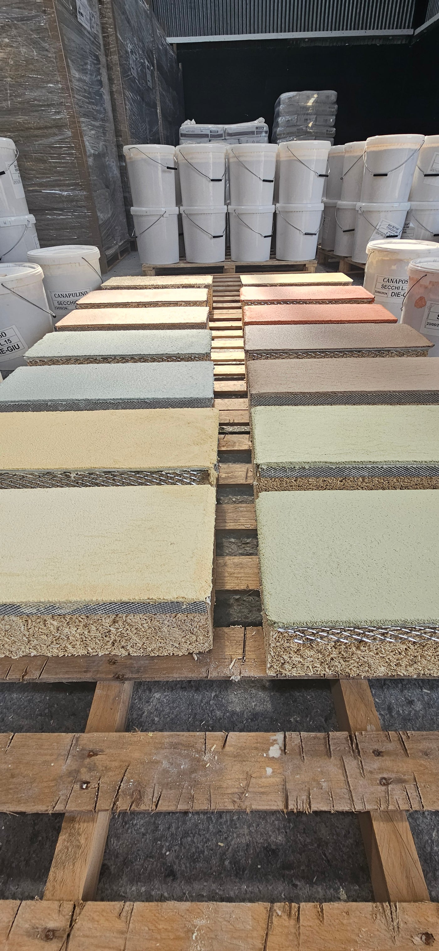 Hemp Blocks with samples of different Hemp Lime Plaster Colors that are available to order