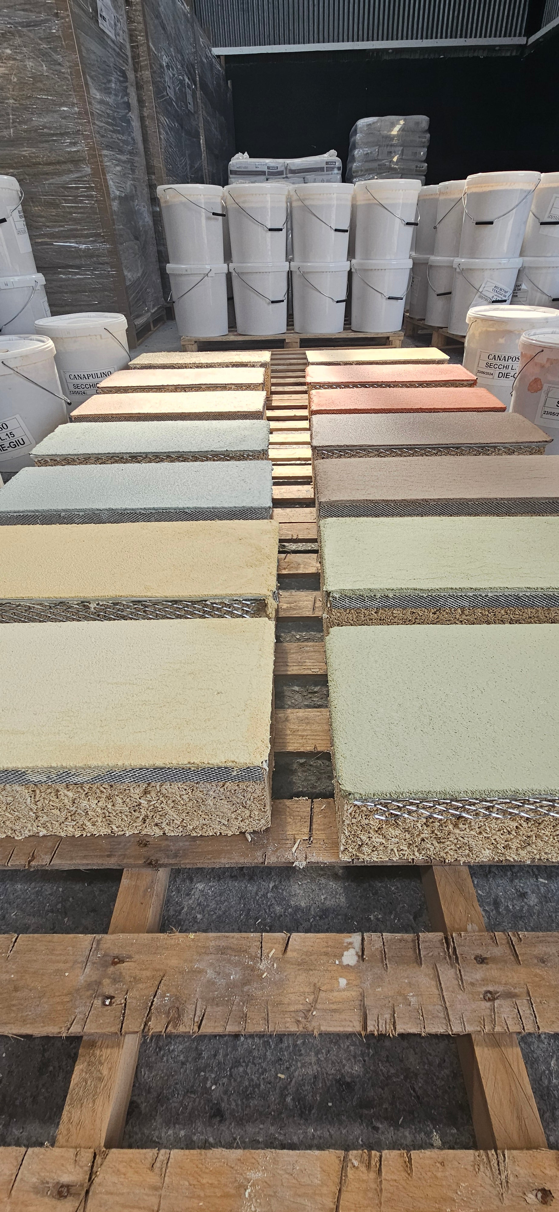 Hemp Blocks with samples of different Hemp Lime Plaster Colors that are available to order